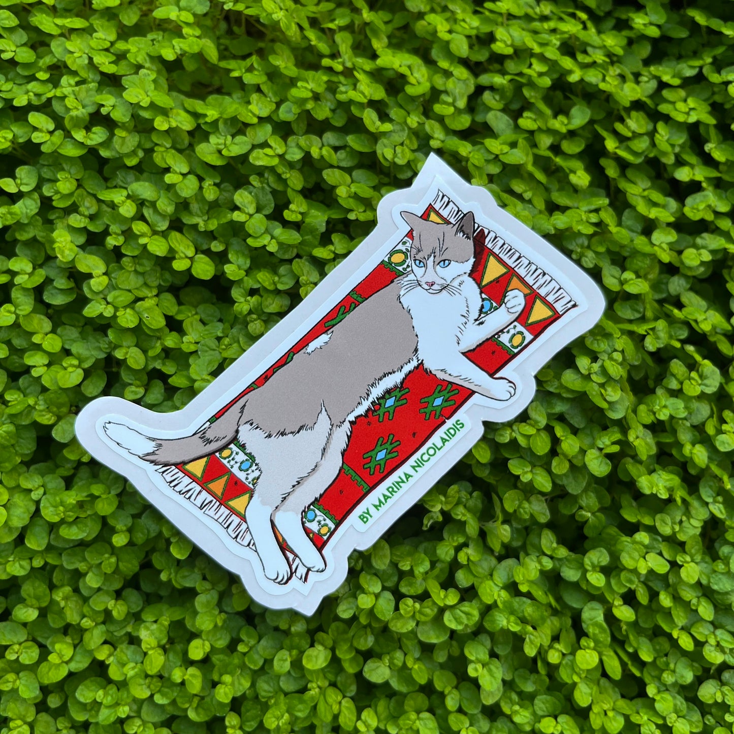 Cat on a carpet sticker