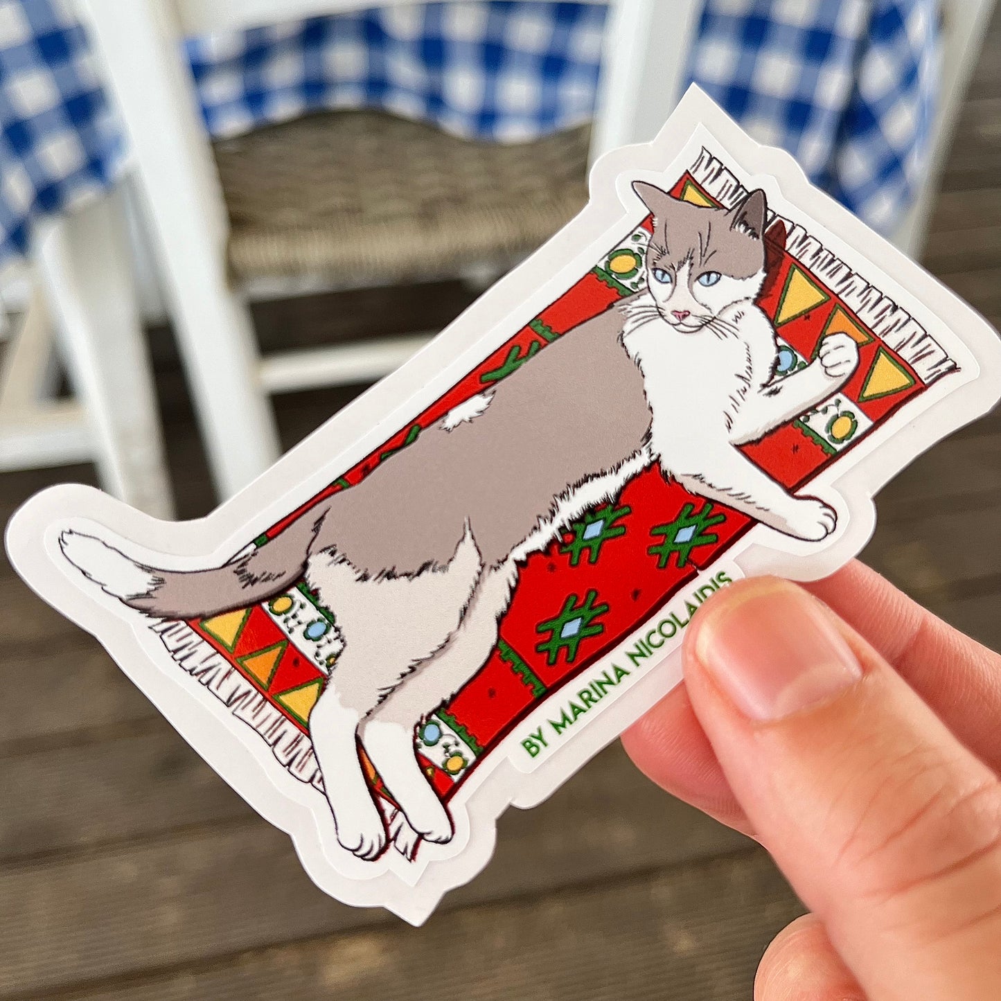 Cat on a carpet sticker