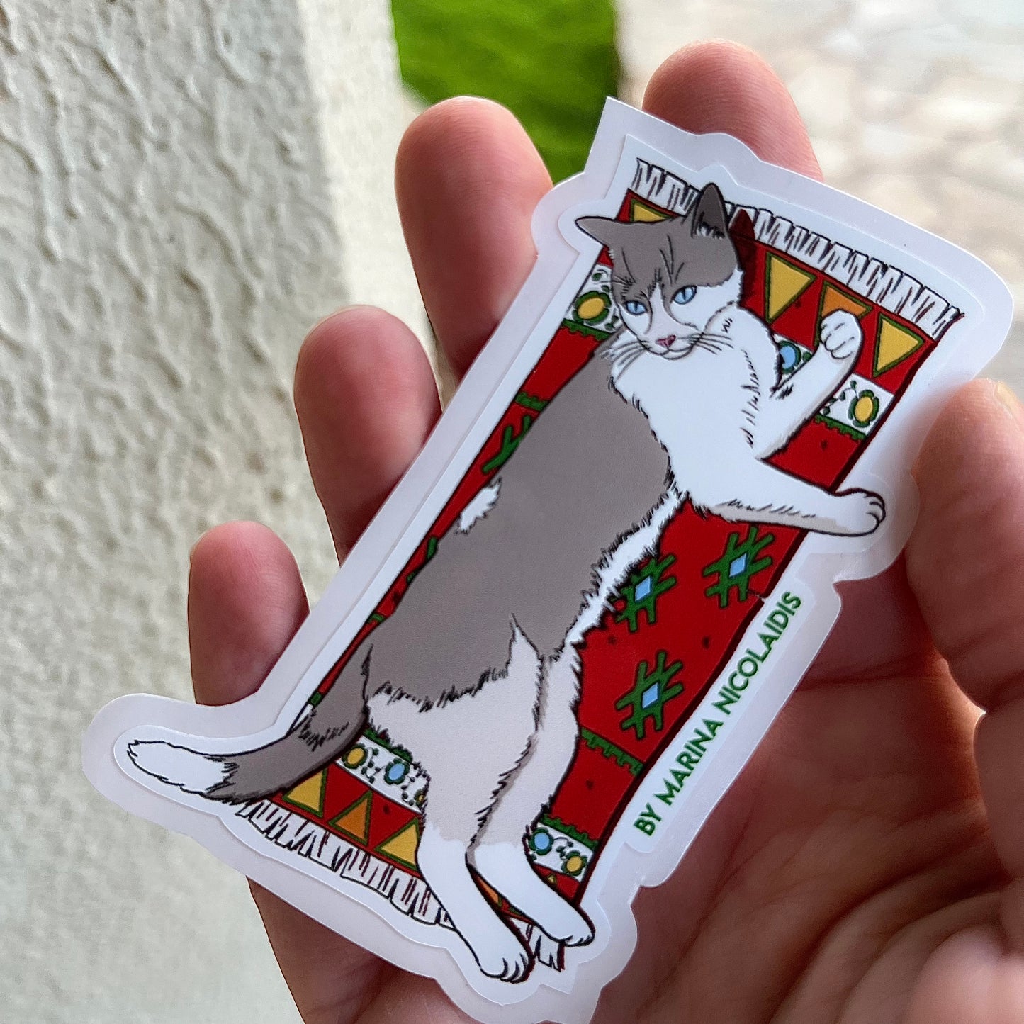 Cat on a carpet sticker