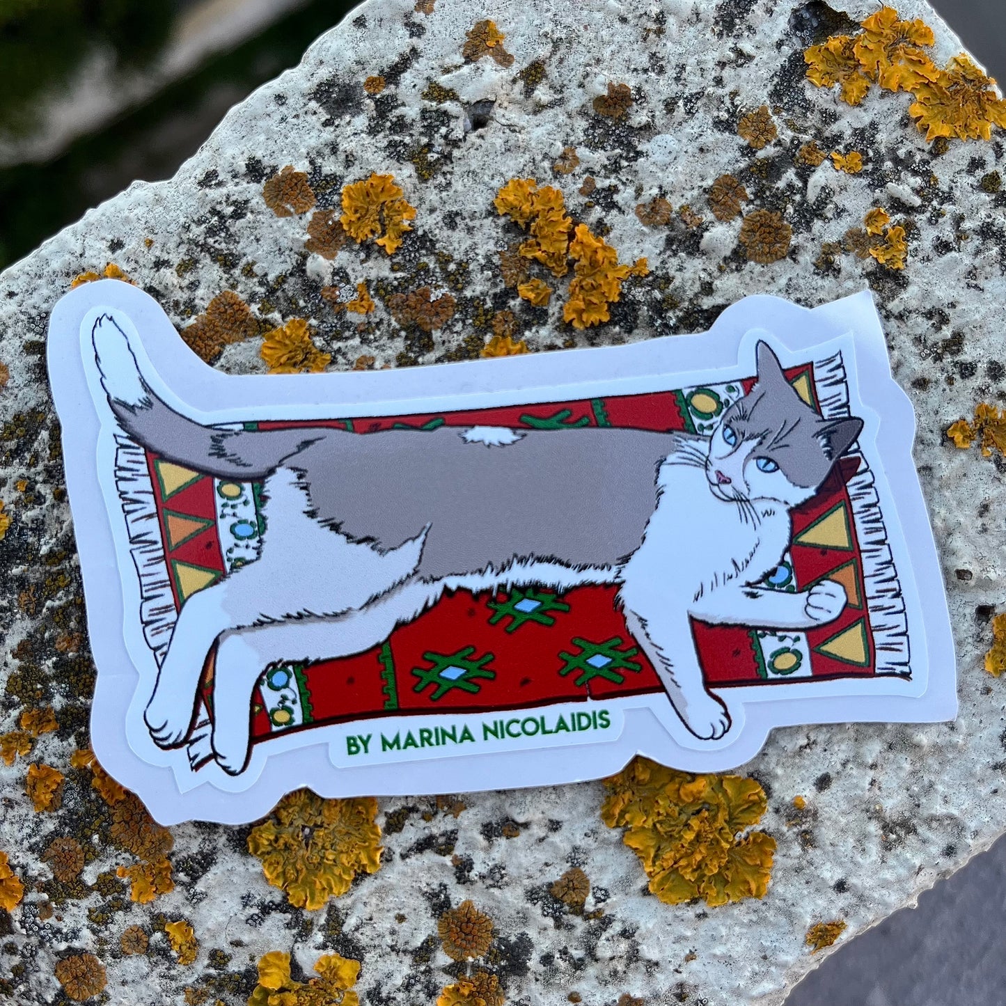Cat on a carpet sticker